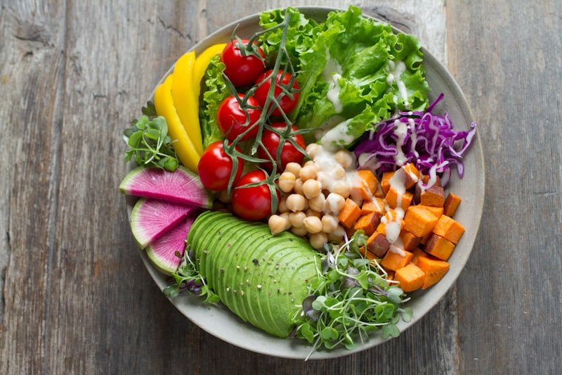 Colorful healthy food spread with fresh vegetables and fruits
